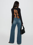 back view of model wearing Princess Polly Laguardia Wide Leg Jeans Dark Blue Wash Mid Rise 