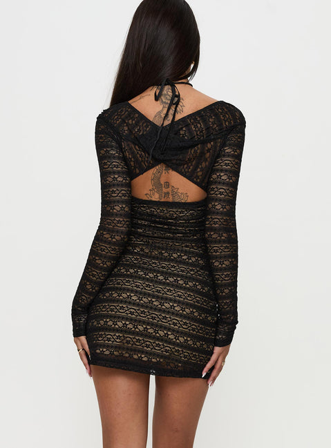 back view of model wearing Princess Polly Porchia Long Sleeve Mini Dress Black V-Neck 