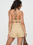Romper Fixed halter neck, Button front fastening, partially exposed back, elastived back strap, belt looped waist, twin hip pockets
