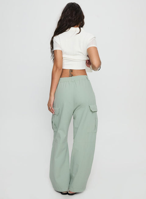 back view of model wearing Princess Polly Elanthea Cargo Pants Green High Waisted Pants 