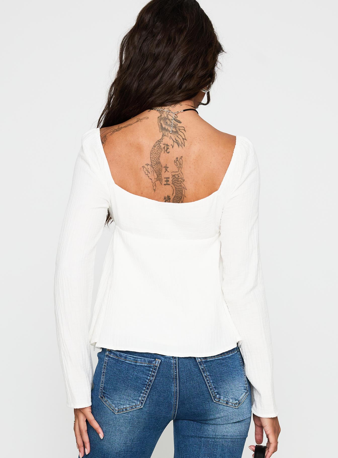 back view of model wearing Princess Polly Khalea Long Sleeve Top White Full Sleeves Sweetheart 