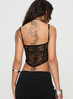 back view of model wearing Princess Polly Phases Corset Top Black Sleeveless Sweetheart 