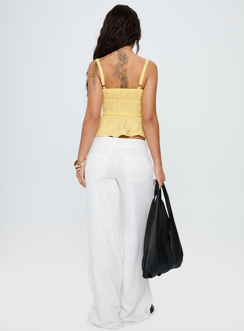 back view of model wearing Princess Polly Pedra Wide Leg Pant White Low Rise Pants 