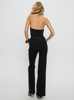 back view of model wearing Princess Polly Magic Mirror Mid Rise Bootleg Jeans Washed Black Mid Rise Jeans 