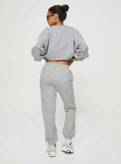 back view of model wearing Princess Polly Princess Polly Track Pants Cursive Text Grey Marle/ Red High Waisted Pants 