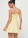 back view of model wearing Princess Polly Xantha Mini Dress Yellow Sweetheart Neckline 