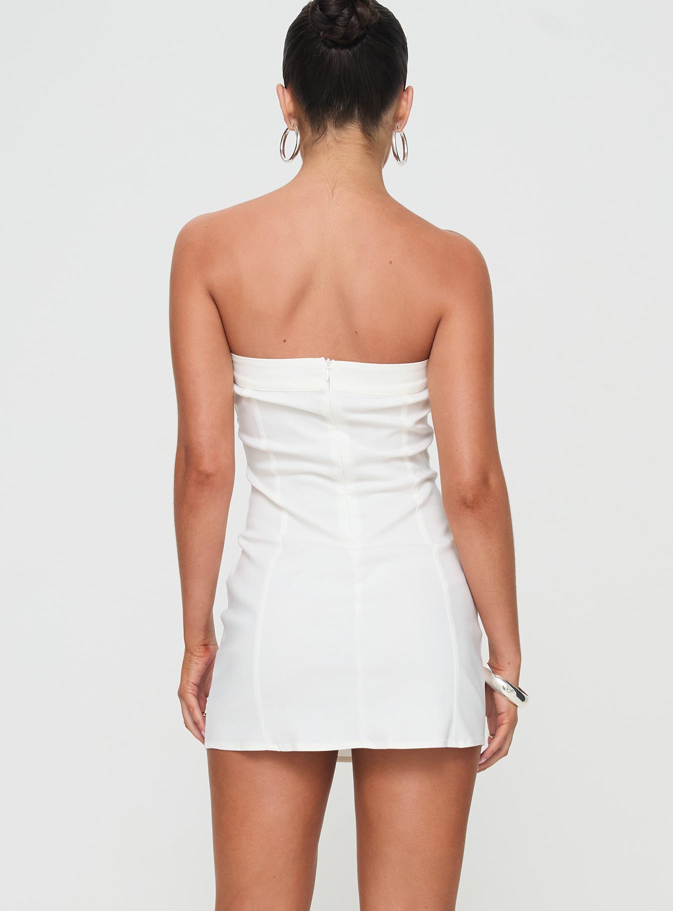 back view of model wearing Princess Polly Roksana Strapless Mini Dress White Straight Neck 