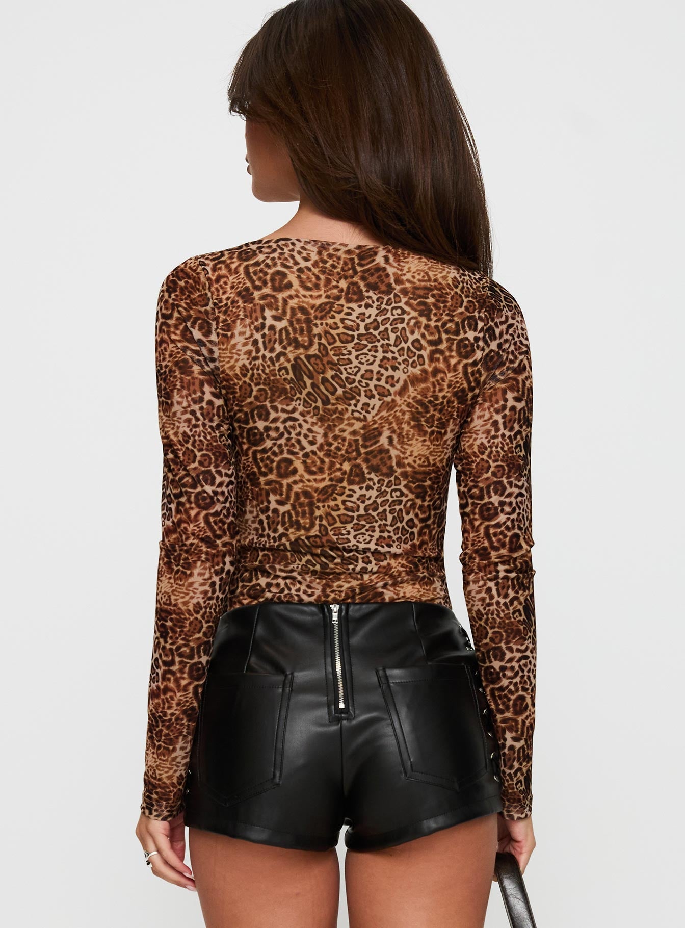 back view of model wearing Princess Polly Elixia Long Sleeve Bodysuit Leopard Long Sleeve Tops 