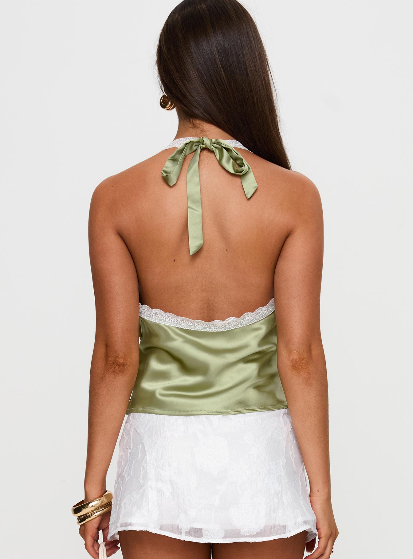 back view of model wearing Princess Polly Bimbette Halter Cami Top Green Sleeveless Plunger 
