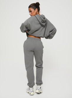 back view of model wearing Princess Polly Princess Polly Track Pants Bubble Text Charcoal / Light Pink Mid Rise 