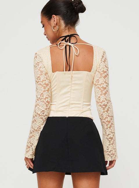 back view of model wearing Princess Polly Markwell Long Sleeve Bodysuit Cream Full Sleeves Sweetheart 