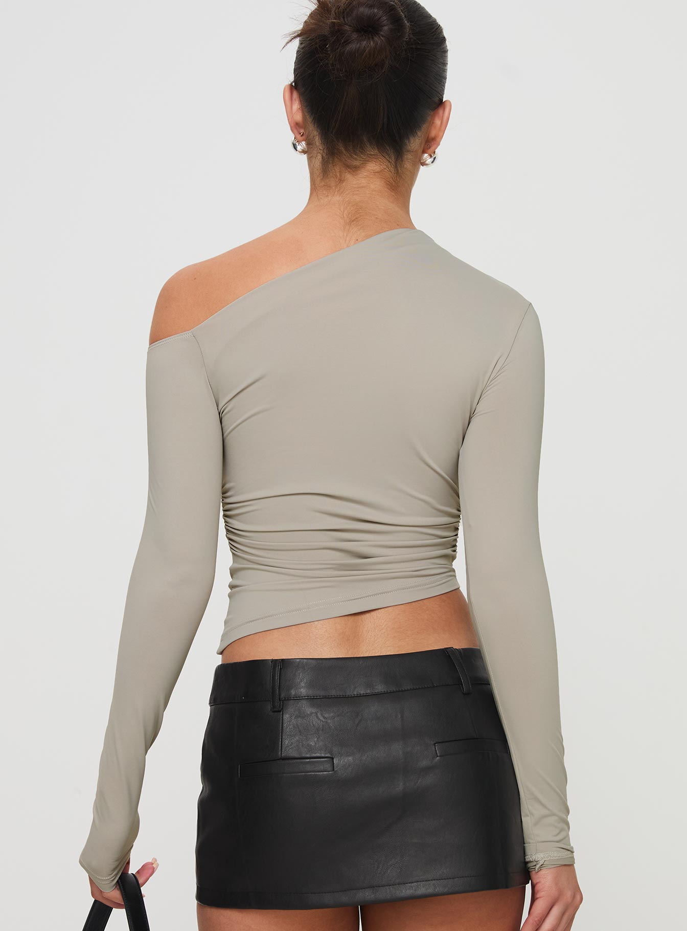 back view of model wearing Princess Polly Unplugged Long Sleeve Top Grey Full Sleeves Asymmetric Neckline 