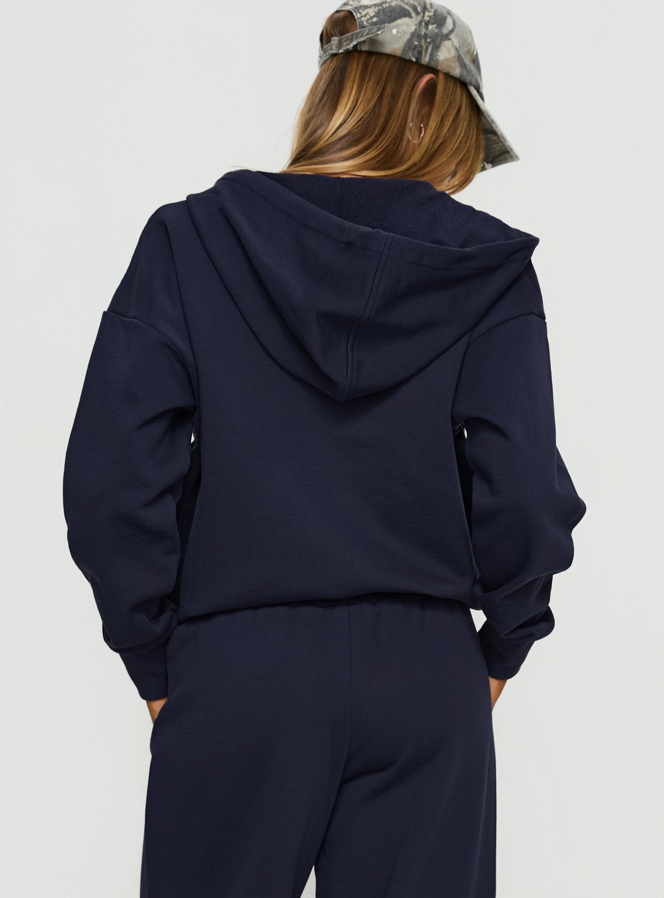 back view of model wearing Princess Polly All Day Oversized Hoodie Navy cropped 