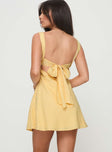 back view of model wearing Princess Polly Mcbeath Mini Dress Yellow Sweetheart Neckline 