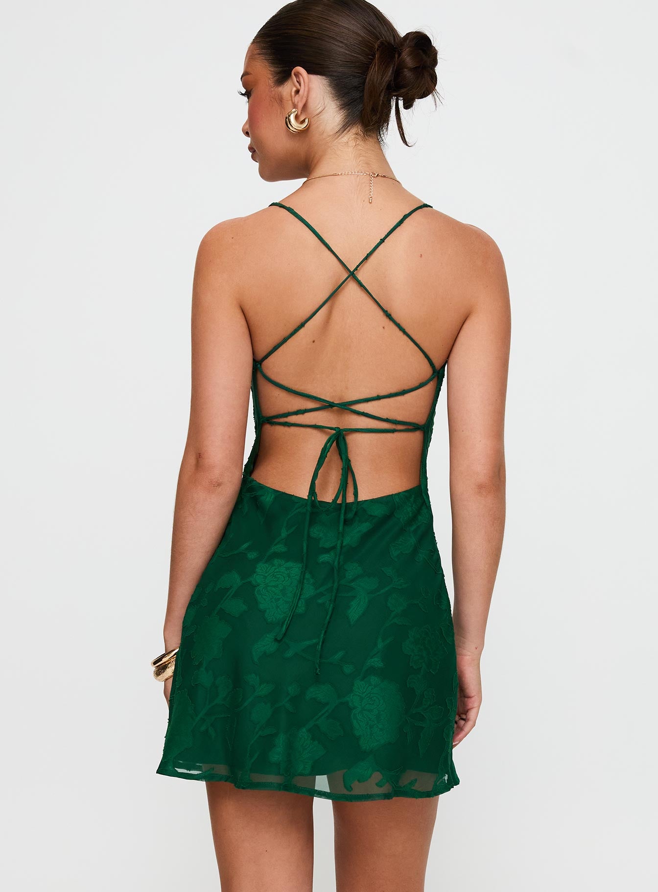back view of model wearing Princess Polly Celena Mini Dress Forest Green Burnout Cowl Neck 