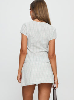 back view of model wearing Princess Polly Prominent Mini Skirt Green Check Mini Skirts 