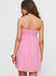 back view of model wearing Princess Polly Osment Strapless Mini Dress Pink Straight Neck 