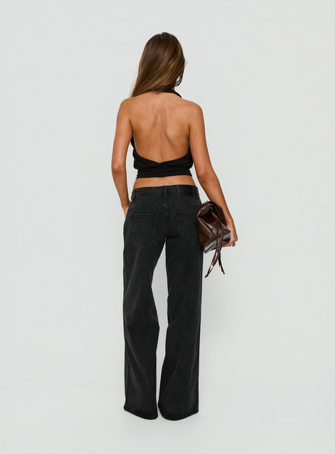 Highlighting the Picco Ultra Low Rise Wide Leg Jeans Washed Black in womens-jeans back view of model wearing