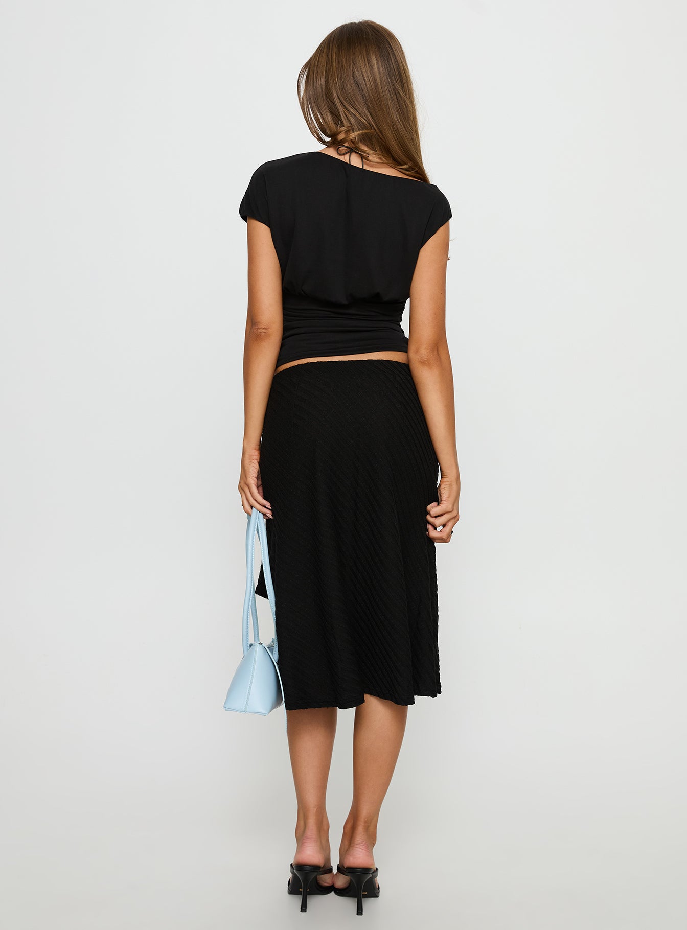 back view of model wearing Princess Polly Esmeray Midi Knit Skirt Sheer Black 