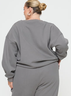 back view of model wearing Princess Polly Princess Polly Crew Neck Sweatshirt Puff Text Charcoal Curve 