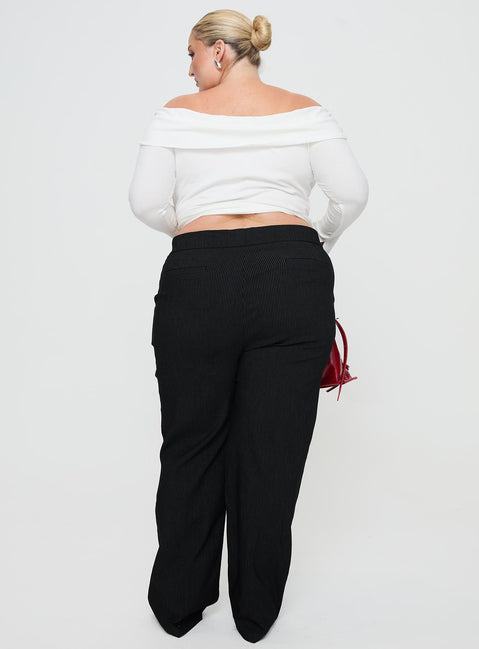 back view of model wearing Princess Polly Jeller Pinstripe Pants Black Curve High Waisted Pants 