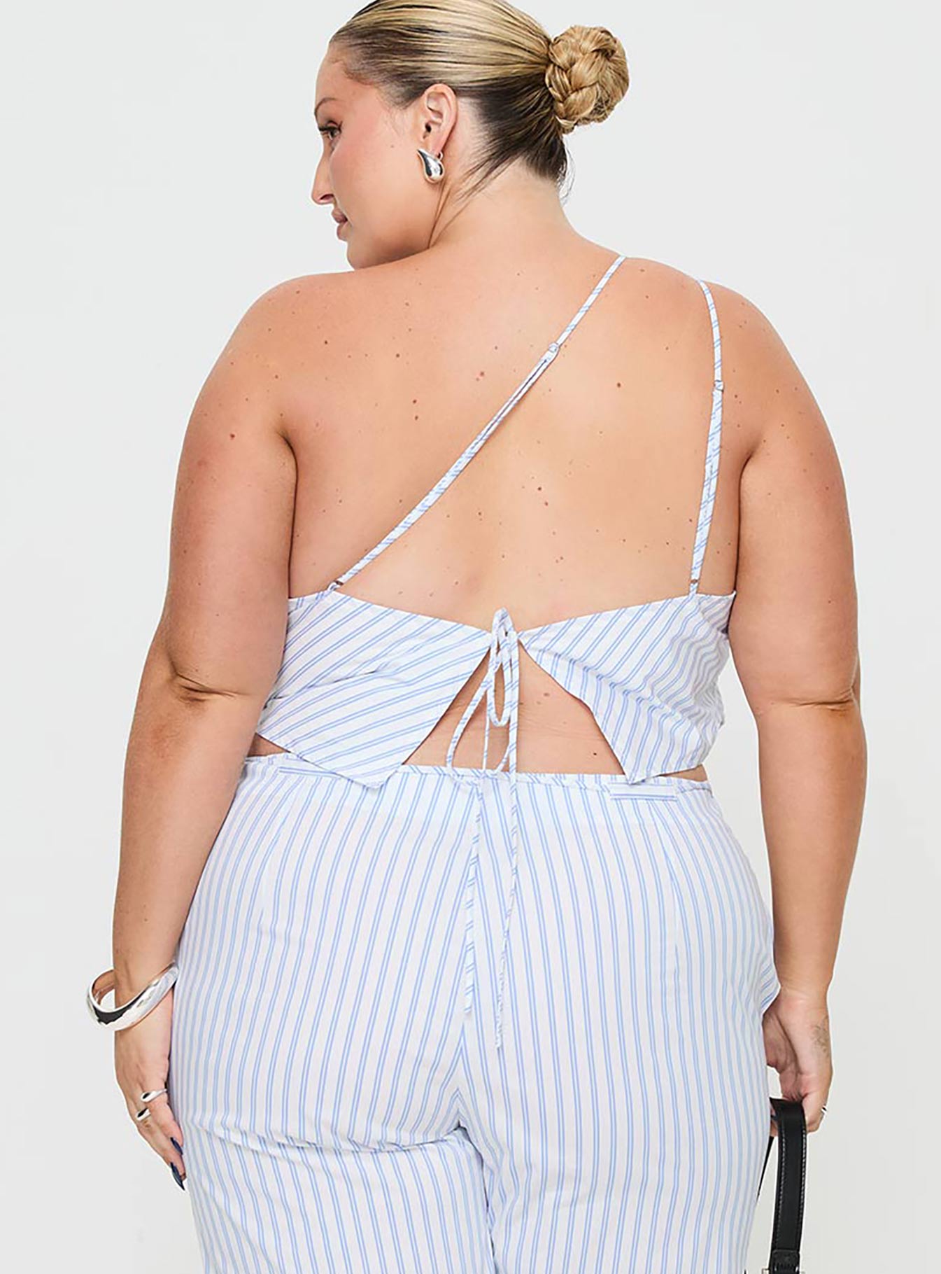 back view of model wearing Princess Polly Collied Asymmetric Top Blue / White Stripe Curve Sleeveless Asymmetric Neckline 