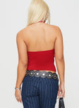 back view of model wearing Princess Polly Stand By Halter Top Red Sleeveless Plunger 