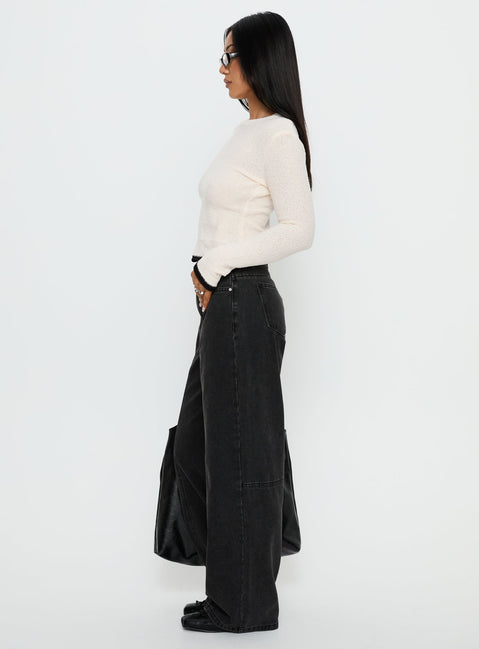 side view of model wearing Princess Polly Lando Low Rise Straight Leg Jeans Washed Black Low Rise Jeans 