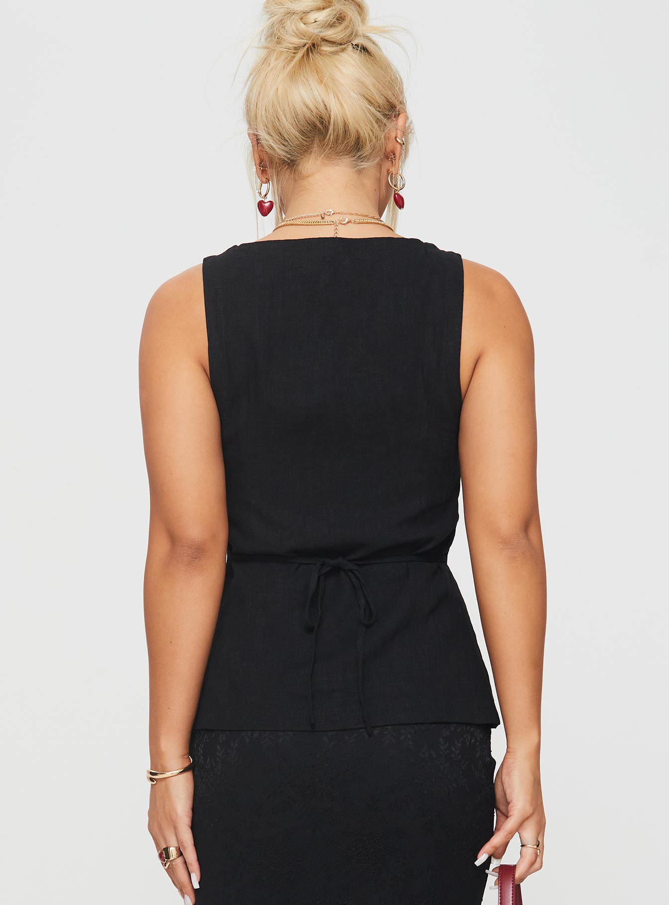 back view of model wearing Princess Polly Spirito Vest Top Black Sleeveless Scoop Neck 