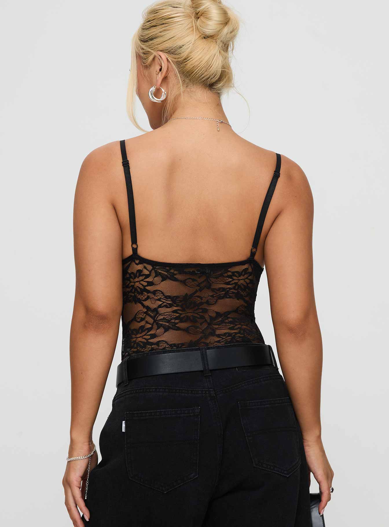 back view of model wearing Princess Polly Wystan Lace Bodysuit Black Sleeveless Plunger 