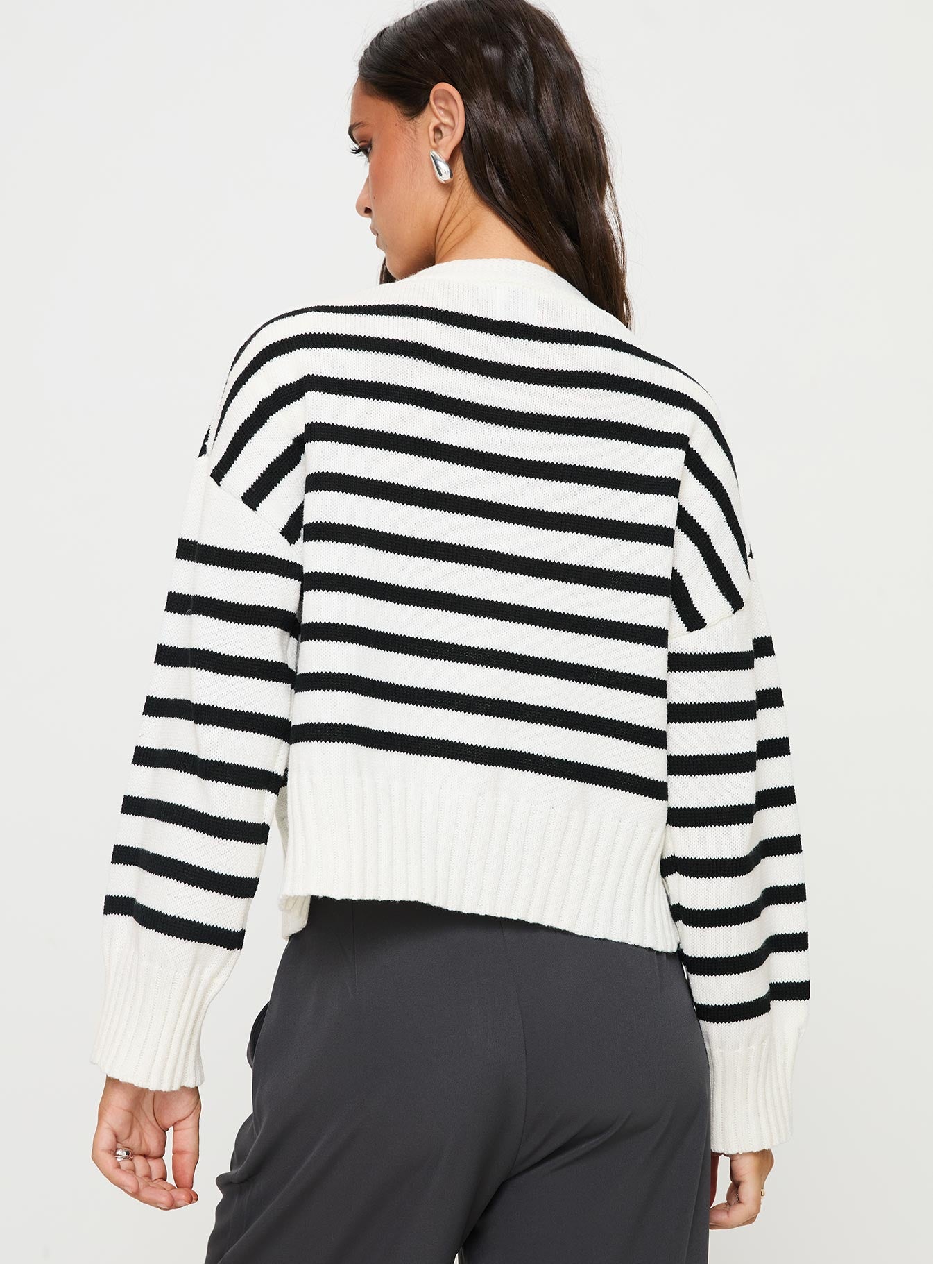 back view of model wearing Princess Polly Karlson Striped Cardigan Cream / Black cropped 