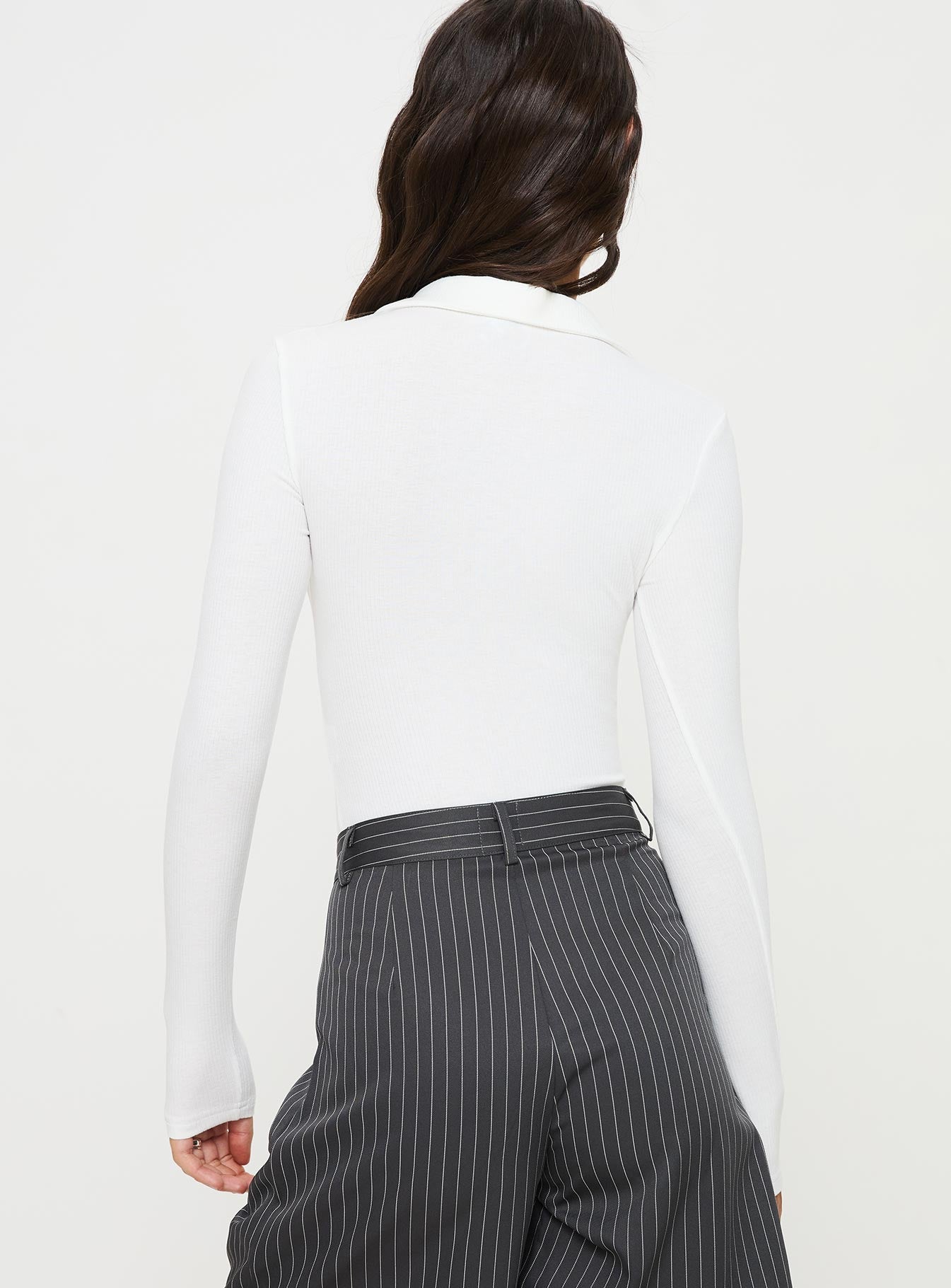 back view of model wearing Princess Polly Tarpley Long Sleeve Bodysuit White Full Sleeves 