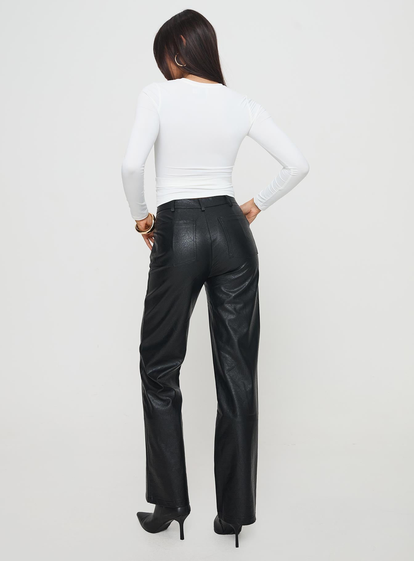 back view of model wearing Princess Polly Benner Low Waist Wide Leg Faux Leather Pants Black High Waisted Pants 