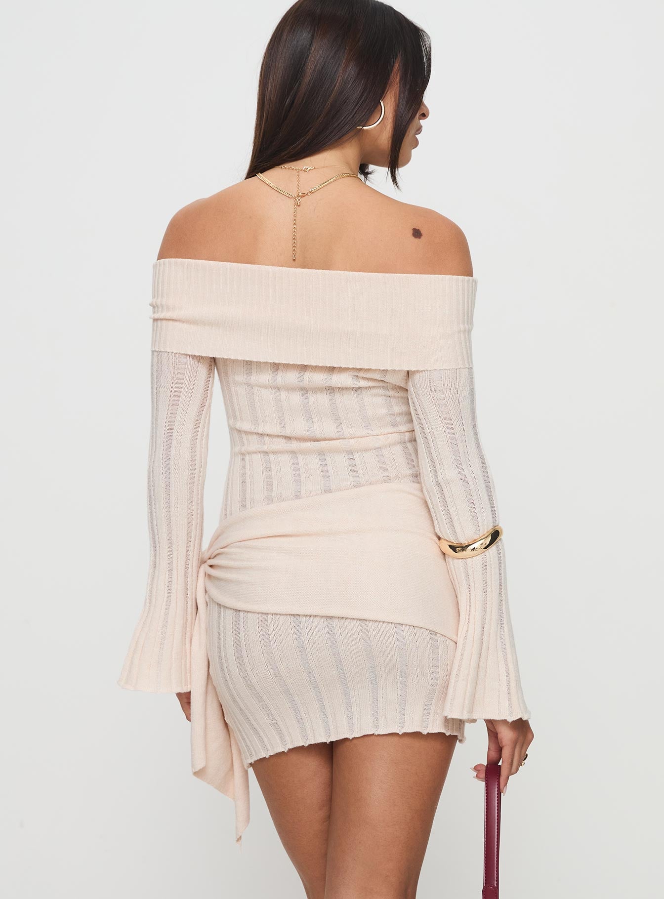 back view of model wearing Princess Polly Oalie Off The Shoulder Mini Dress Cream Straight Neck 