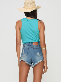 back view of model wearing Princess Polly Dawsorn Distressed Denim Shorts Mid Blue High Waisted Shorts 