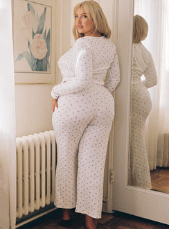 Matching two piece set Long sleeve top, v neckline, frill trimming Mid rise pants, bow detail, straight leg