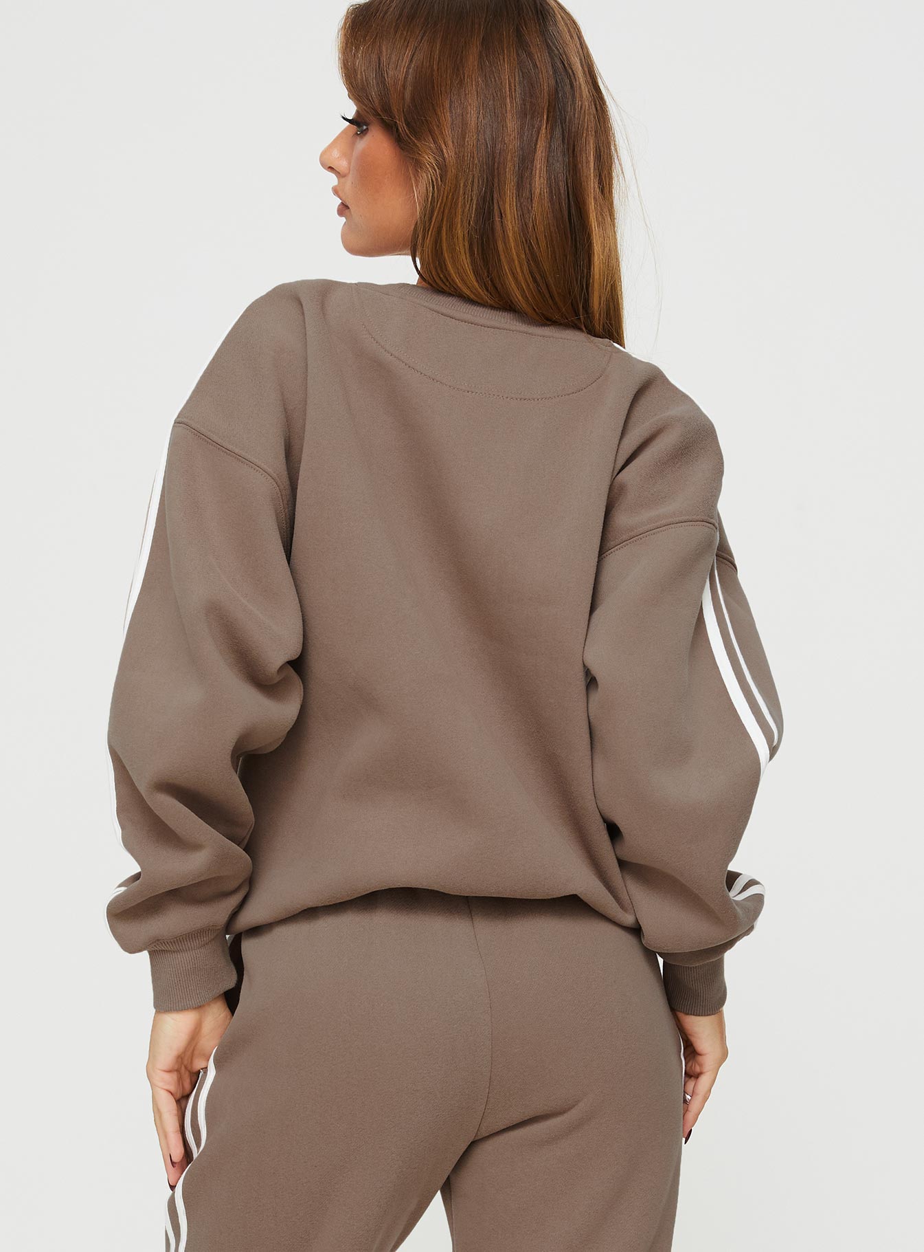 back view of model wearing Princess Polly Princess Polly Crew Neck Sweatshirt Stripe Taupe / White regular 