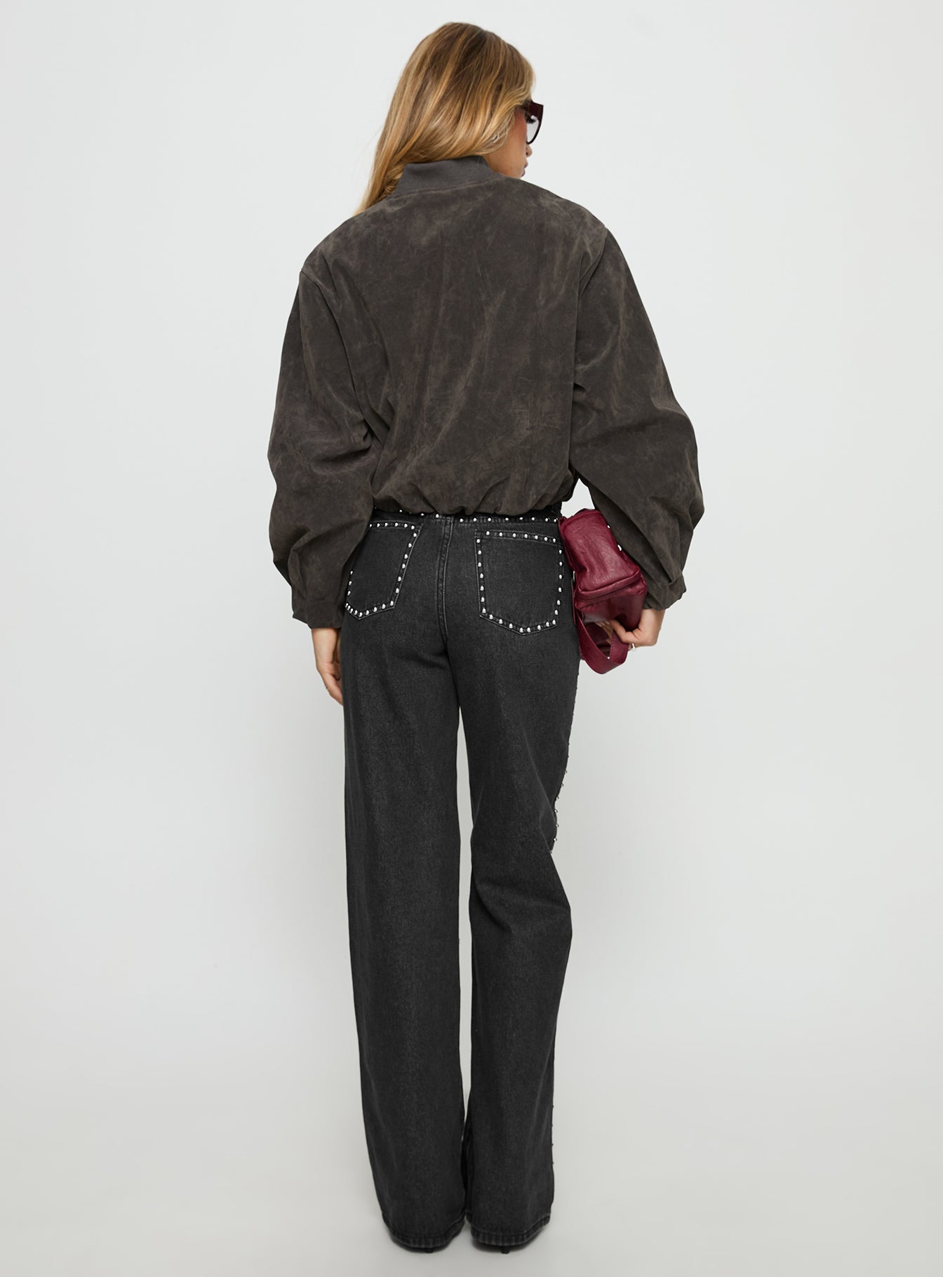 back view of model wearing Princess Polly Saving Up Stud Detail Jeans Jet Black High Rise Jeans 