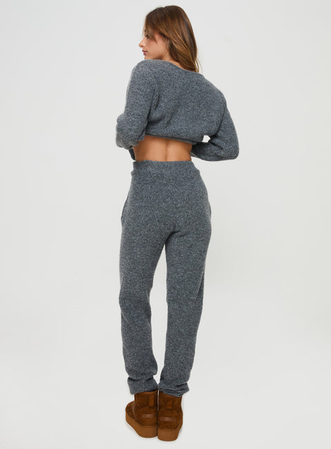 side view of model wearing Princess Polly Abrams Rib Knit Pants Charcoal Marle High Waisted Pants 