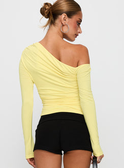 back view of model wearing Princess Polly Beller Long Sleeve Top Lemon Full Sleeves Asymmetric Neckline 