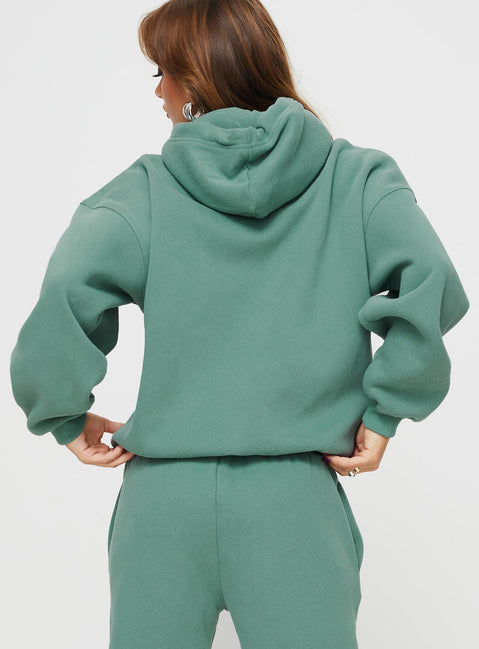 back view of model wearing Princess Polly Princess Polly Hooded Sweatshirt Bubble Text Sage / Eggshell regular 