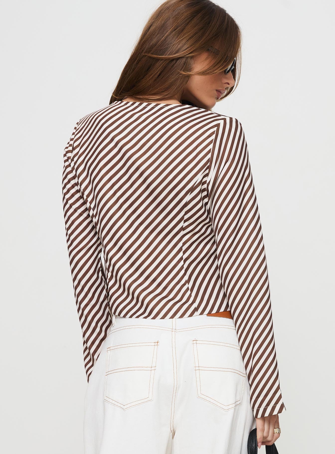 back view of model wearing Princess Polly Maxette Long Sleeve Tie Top Brown Stripe Full Sleeves V-Neck 