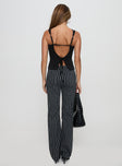 back view of model wearing Princess Polly Allude Low Waist Pinstripe Pant Black Low Rise Pants 