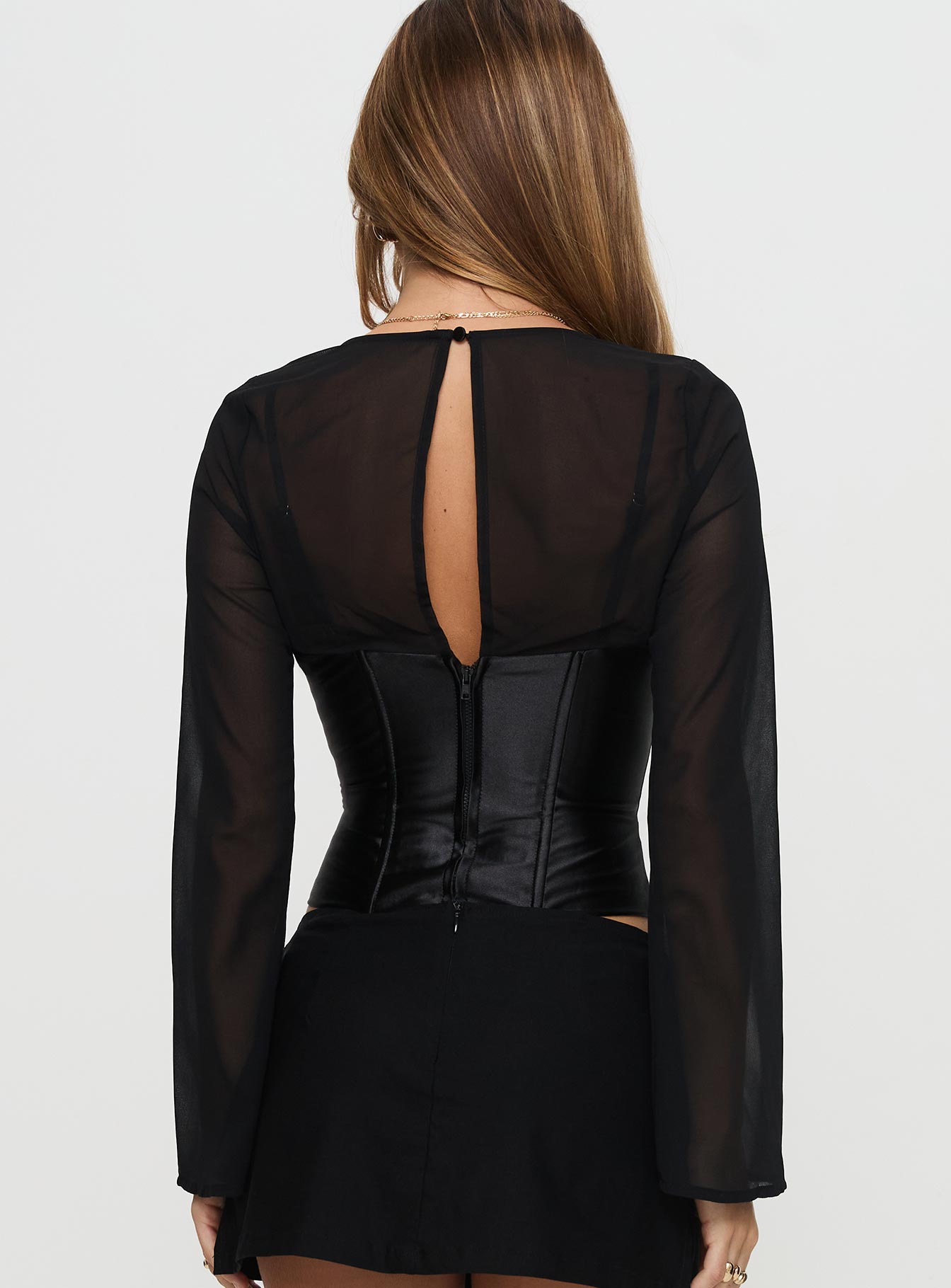 back view of model wearing Princess Polly Bolda Long Sleeve Corset Top Black Full Sleeves Plunger 