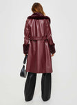 Longline coat Faux leather material, faux fur trimming, button front fastening, twin pockets at sides, removable waist belt