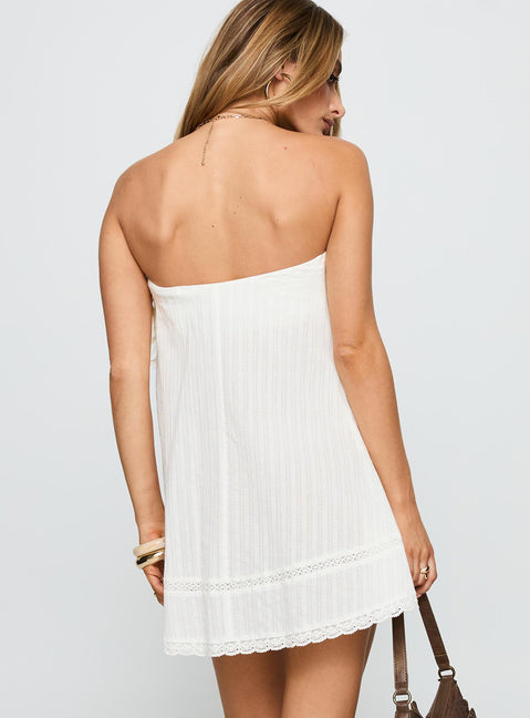 back view of model wearing Princess Polly Gypsea Strapless Swing Mini Dress White Straight Neck 