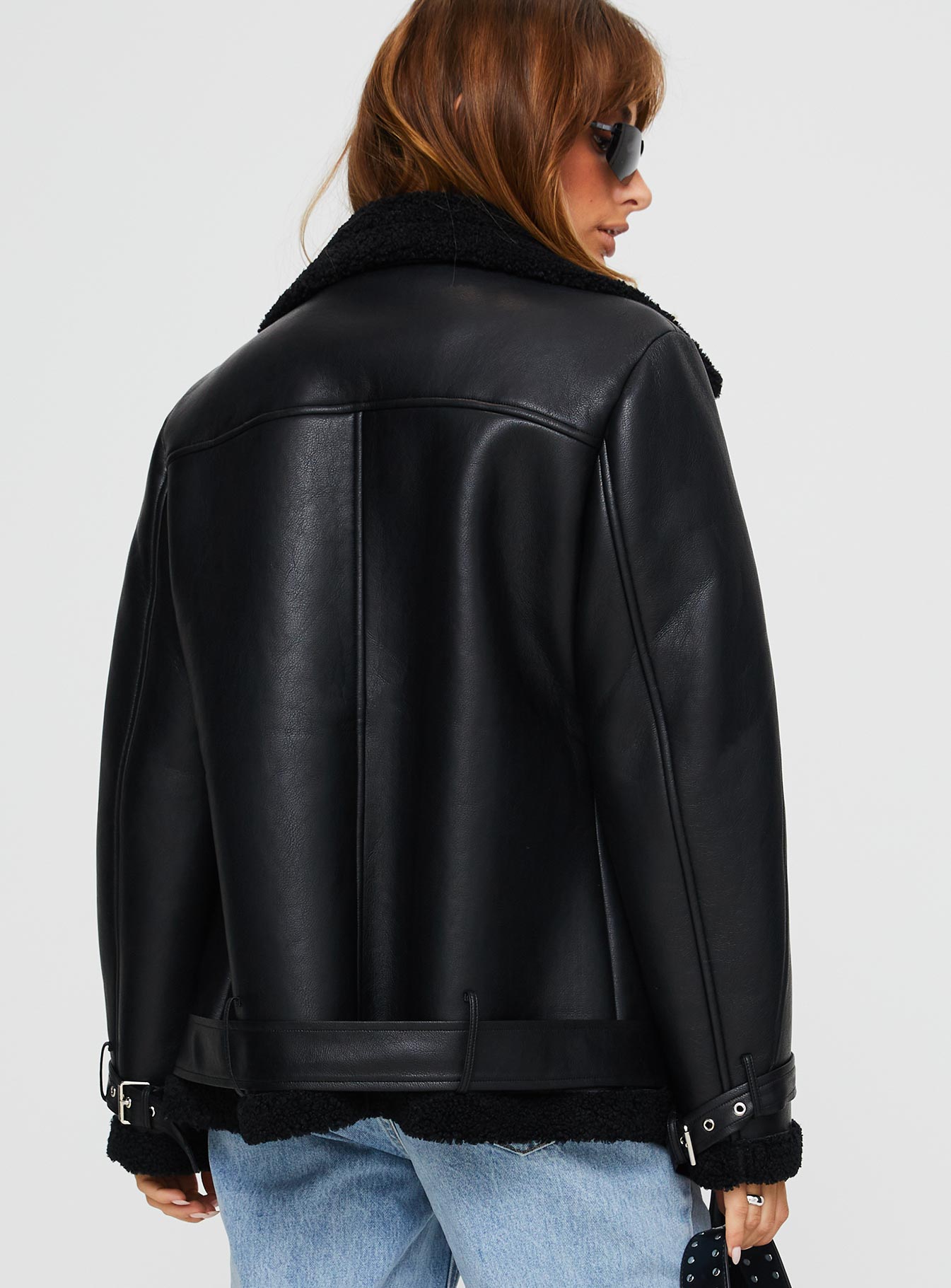 Faux leather jacket Silver-toned hardware, zip fastening down front, twin hip pockets, adjustable & removable belt Non-stretch material, shearling lined