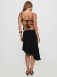 back view of model wearing Princess Polly Pappilion Asymmetrical Midi Skirt Black Midi Skirts 