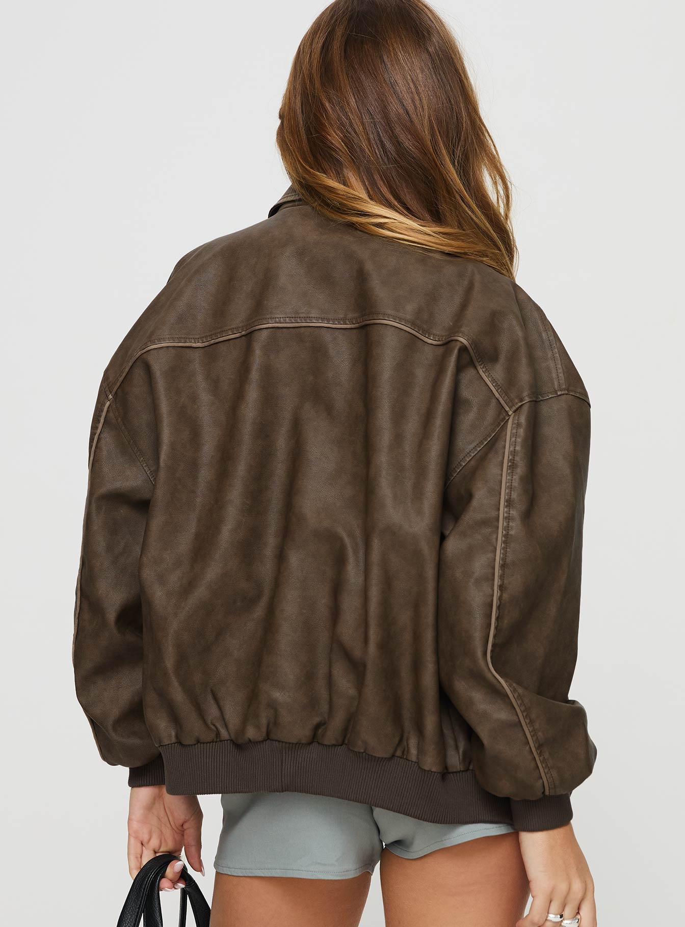 Faux leather bomber jacket  Classic collar, ribbed waistband and cuffs, zip front fastening, twin hip pockets  Non-stretch, fully lined 