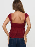 back view of model wearing Princess Polly Elysea Top Burgundy Short Sleeves Plunger 